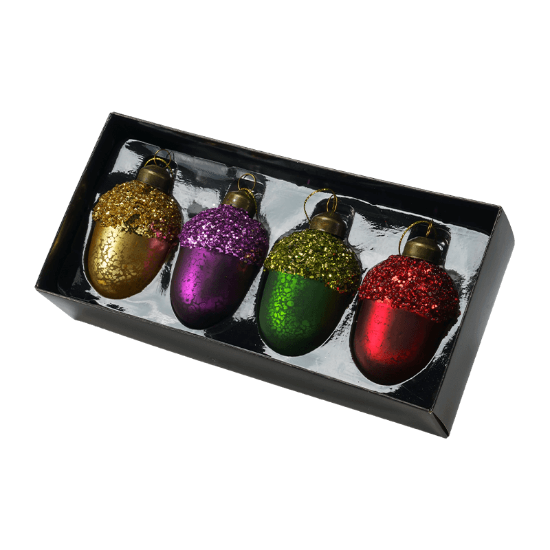 Kerstcadeausets met glazen ornamenten